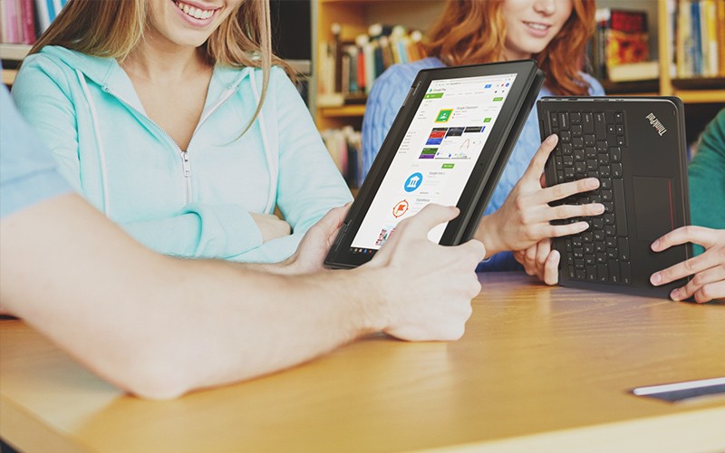 Inspire by incorporating mobile devices into your learning environment Teacher helping student out with assignment