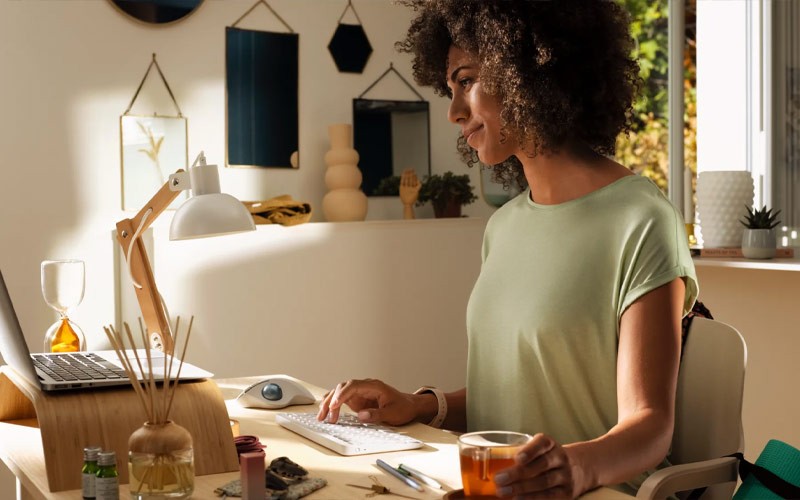 Home worker using Logitech keyboard