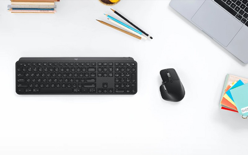 Logitech keyboard and mouse on a desk