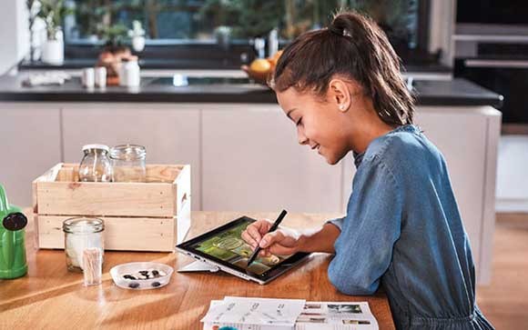 Engineer working on Microsoft Surface in the field
