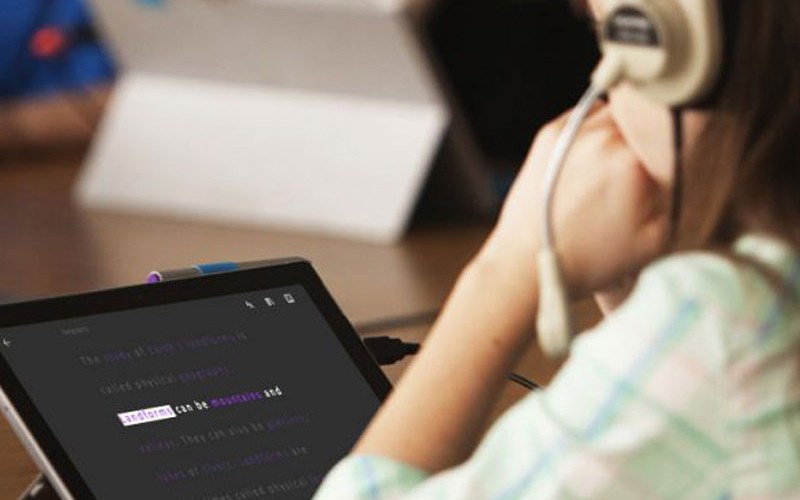 Microsoft technology industry solutions Engineer working on Microsoft Surface in the field