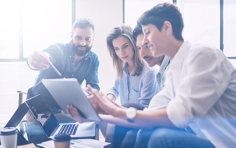 Meet your demanding enterprise storage requirements Group of colleagues working on a project