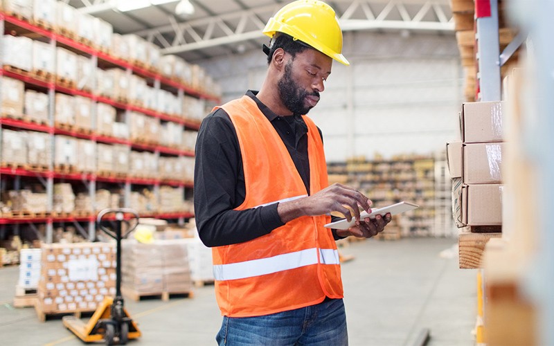 2394330-vmware-image-1 Man in high vis in a warehouse
