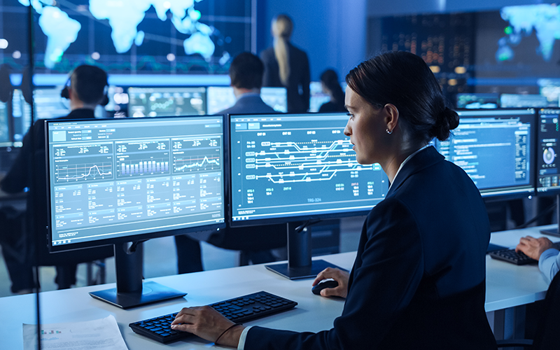 Palo Alto Unit 42 A woman working with code at a computer