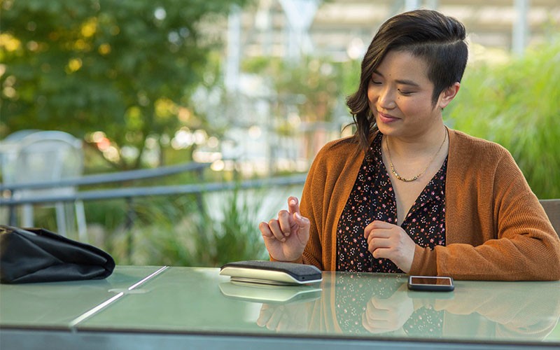 Businessman using desk phone