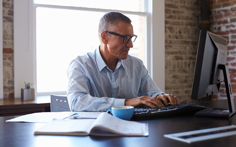 Business man working on laptop