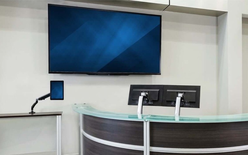 Ergonomic display mounts for your business Office reception with mounted displays