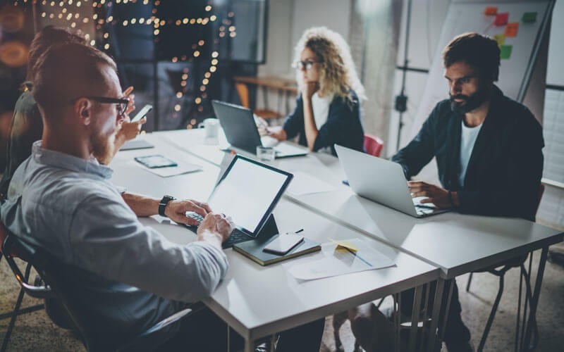 Symantec cloud-based console and built-in integration help you secure your entire infrastructure Group of employees working together