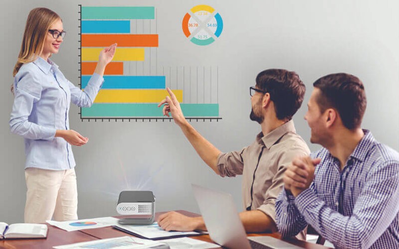 Ideal solution for any conference room Colleagues using a projector in a meeting