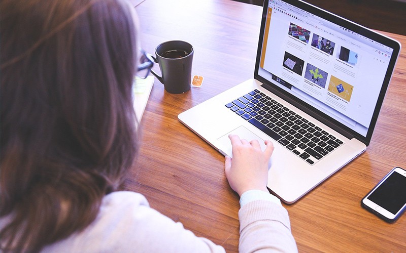 Insight Cloud Planning Services Woman working on laptop