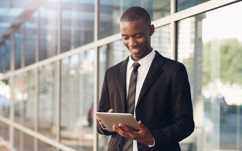 Business man holding tablet