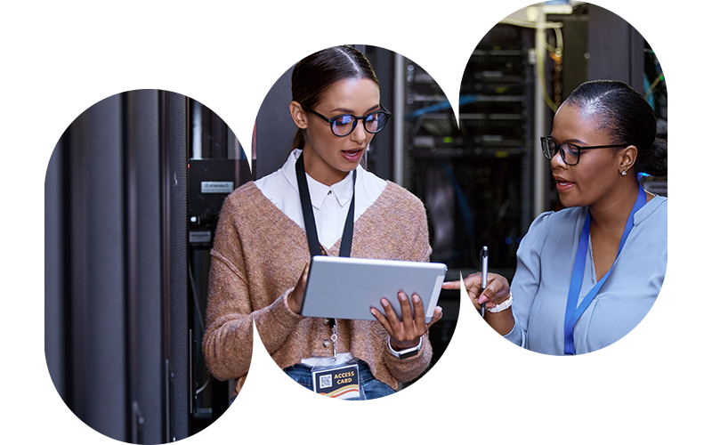 Business professionals discussing in a server room